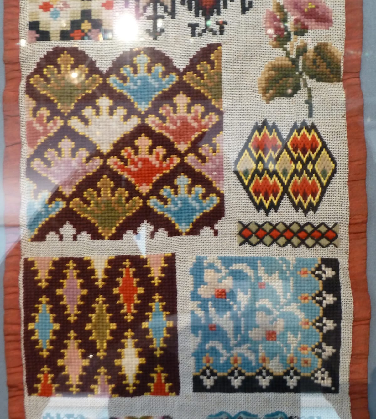 Berlin wool work sampler stitched in wool on linen needlepoint canvas, for the needlepoint canvas size calculator